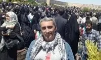 عکس گردشگر سوئیسی با چفیه در مراسم روز قدس