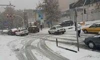 آسمان مه‌آلود و بارش برف و باران در تهران
