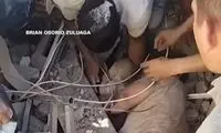 لحظه نجات معجزه‌آسای یک نوزاد از زیر آوار در کلمبیا