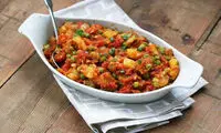 دورچینی غذا با سیب زمینی و نخود فرنگی