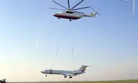 هلی‌کوپتری که هواپیما حمل می‌کند