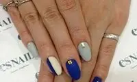 طراحی زیبای ناخن با لاک سبز و آبی