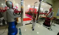 بزرگ‌ترین رستوران رباتی چین +عکس