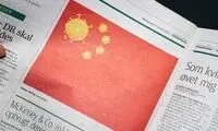 کاریکاتور روزنامه دانمارکی صدای چینی‌ها را درآورد