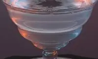 لحظه تركيدن حباب پس از برخورد با آب +عکس