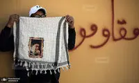 تصویر رهبری در دست معترضان عراقی در بغداد