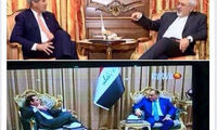 عکس: نشستن ظریف در برابر کری سوژه شد