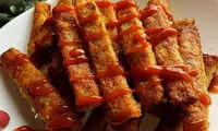 طرز تهیه سیب زمینی پیتزایی؛ فست فود سه‌سوته در منزل