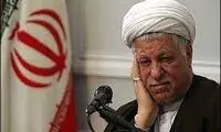 عکسی از رفسنجانی در حال ریشه‌کنی فلج اطفال